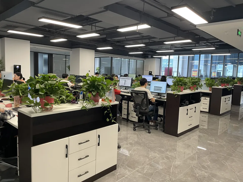 Open-plan sales and engineering office of Zhongli Weiye in Shenzhen, staff working at their desks